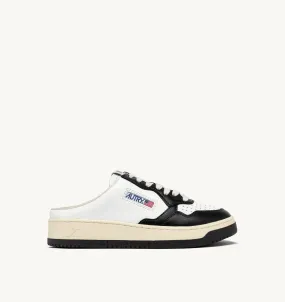 AUTRY NEW ARRIVALS WOMAN WOMAN  MEDALIST MULE SNEAKERS IN WHITE AND BLACK LEATHER