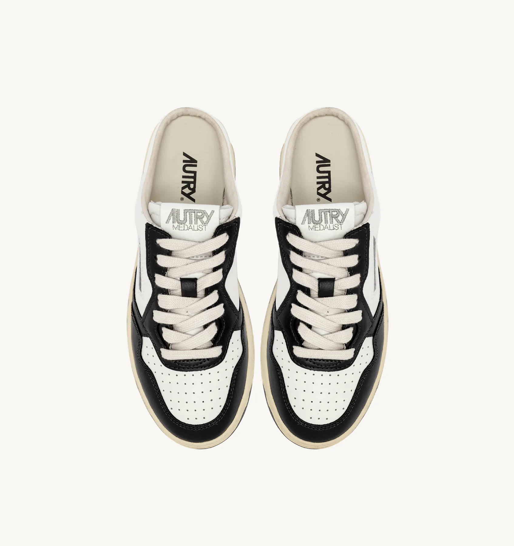 AUTRY NEW ARRIVALS WOMAN WOMAN  MEDALIST MULE SNEAKERS IN WHITE AND BLACK LEATHER