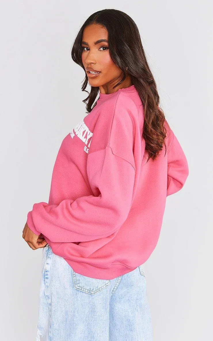 Hoodies & Sweatshirts | Hot Pink Brooklyn Puff Print Sweatshirt | PrettyLittleThing