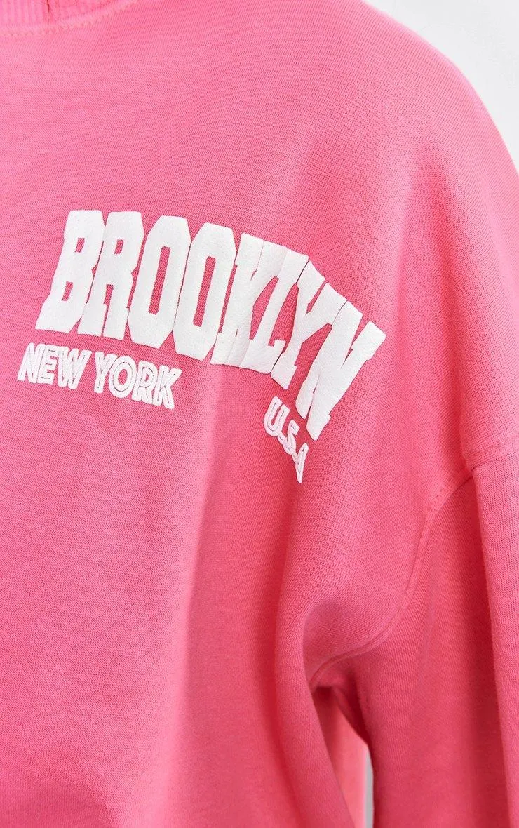 Hoodies & Sweatshirts | Hot Pink Brooklyn Puff Print Sweatshirt | PrettyLittleThing